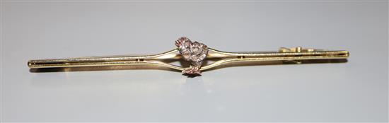 An early 20th century yellow metal and rose cut diamond set chick bar brooch, 65mm, gross 5 grams.